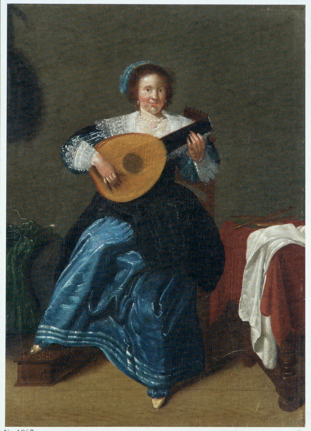 Giovane donna che suona il liuto